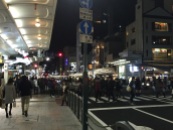 people streaming out on the Kyoto streets nigh